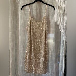 Small cream colored sparkly sequin dress